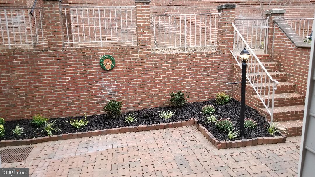 8049 Rising Ridge Road Bethesda, MD 20817 - Photo 33 of 33 a view of a pathway with a chair