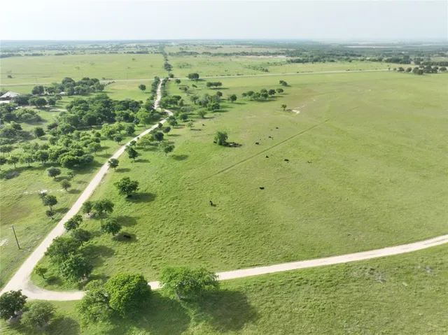 a view of a lake with a city