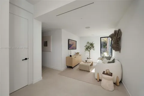 a kitchen with stainless steel appliances granite countertop a sink a stove and a wooden cabinets