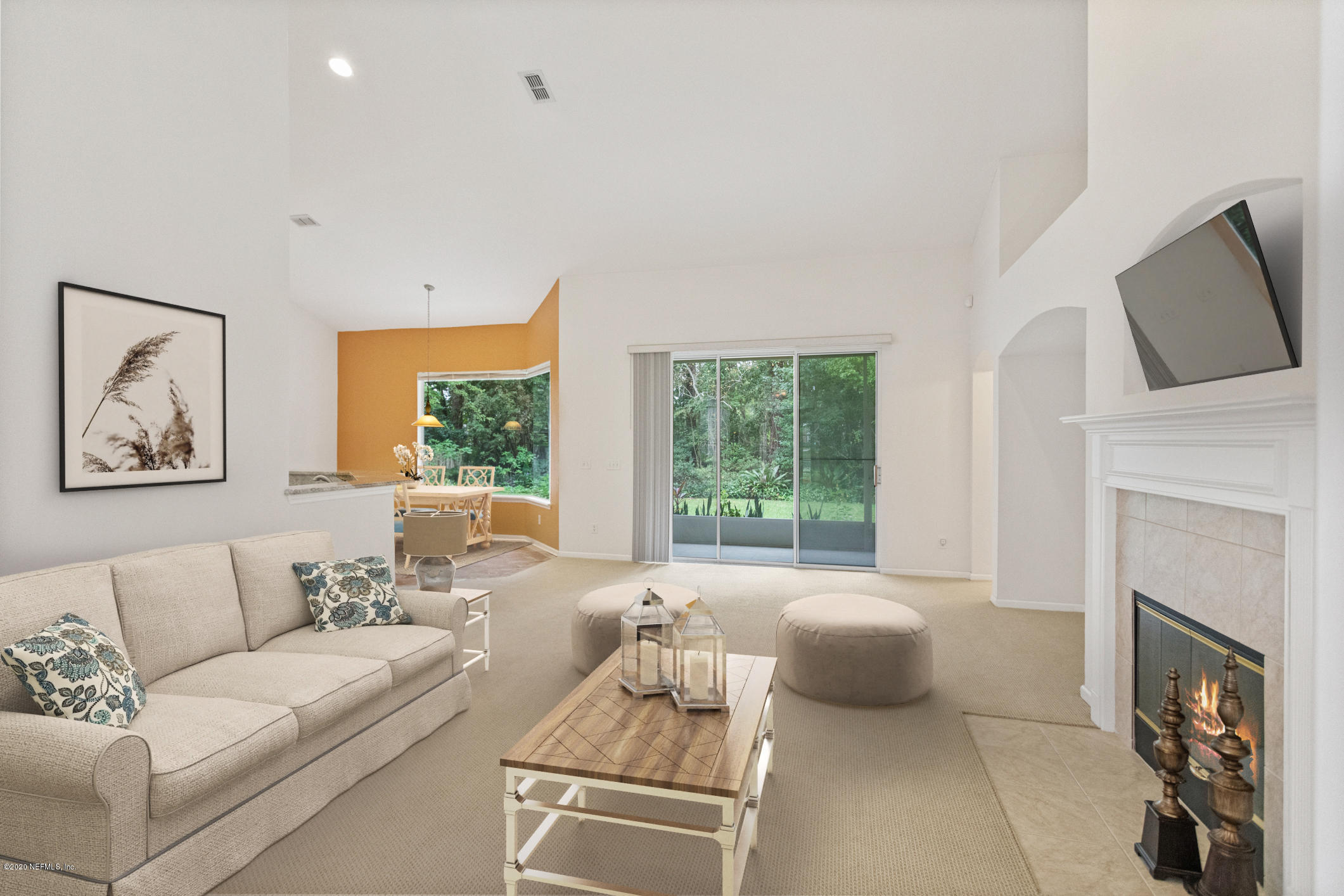 2576 Benjamin Road Jacksonville, FL 32223 - Photo 15 of 53 a living room with furniture and a fireplace