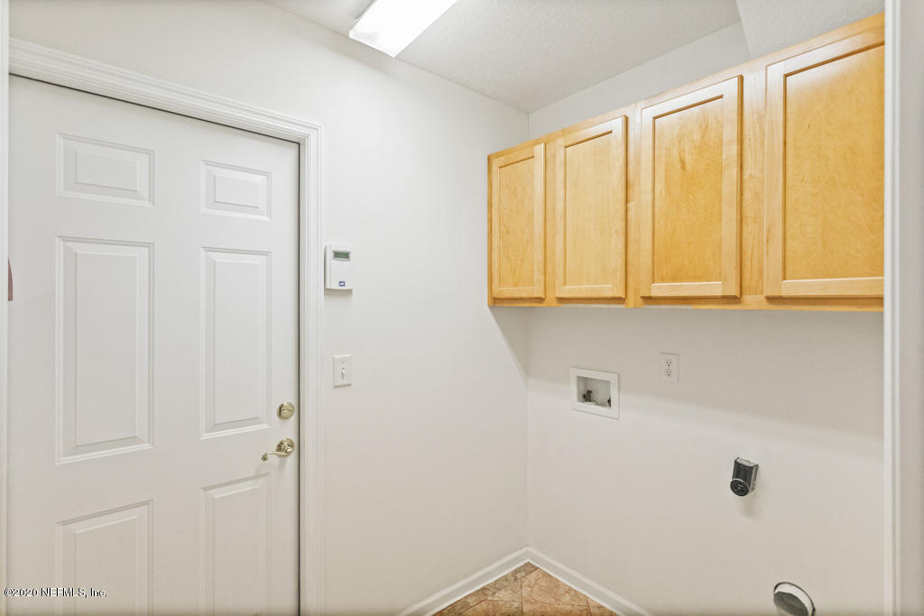 2576 Benjamin Road Jacksonville, FL 32223 - Photo 40 of 53 a bathroom with a window