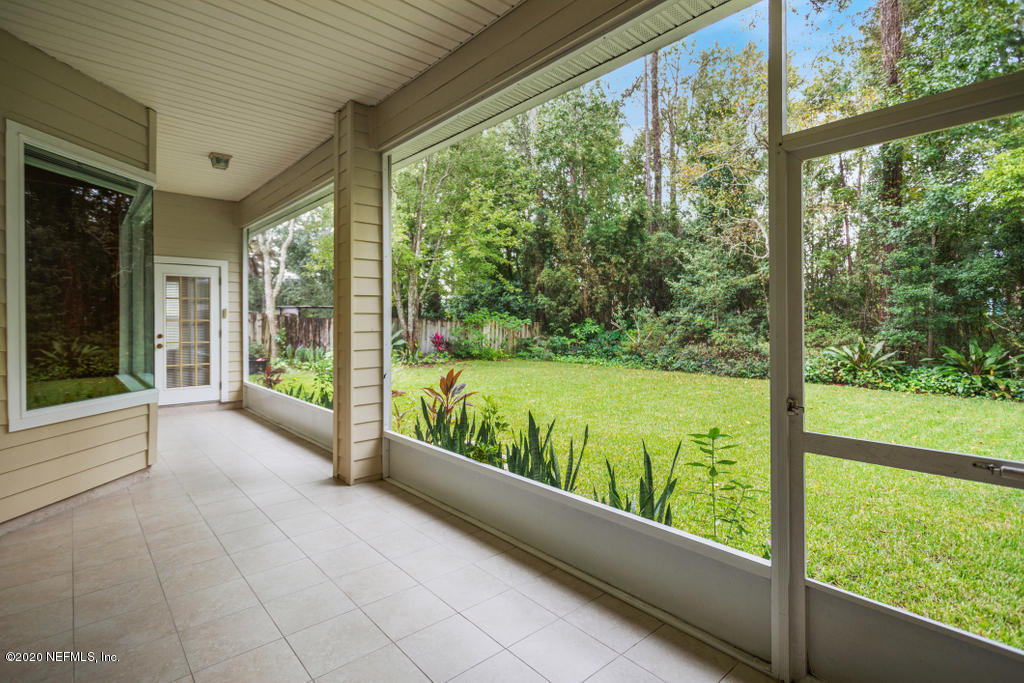 2576 Benjamin Road Jacksonville, FL 32223 - Photo 46 of 53 a view of porch with a swimming pool