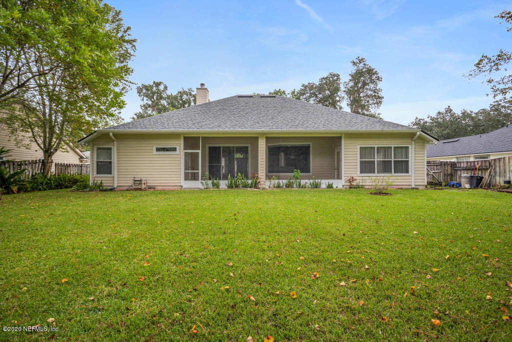 2576 Benjamin Road Jacksonville, FL 32223 - Photo 50 of 53 a front view of house with yard and green space
