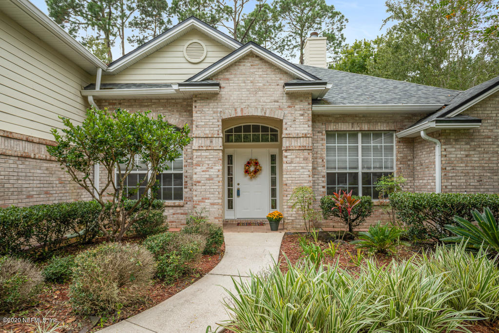 2576 Benjamin Road Jacksonville, FL 32223 - Photo 5 of 53 a front view of a house with garden