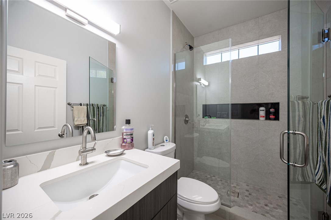 441 Belville Road Pahrump, NV 89048 - Photo 23 of 44 A well-appointed bathroom with a spacious walk-in shower and elegant vanity awaits.