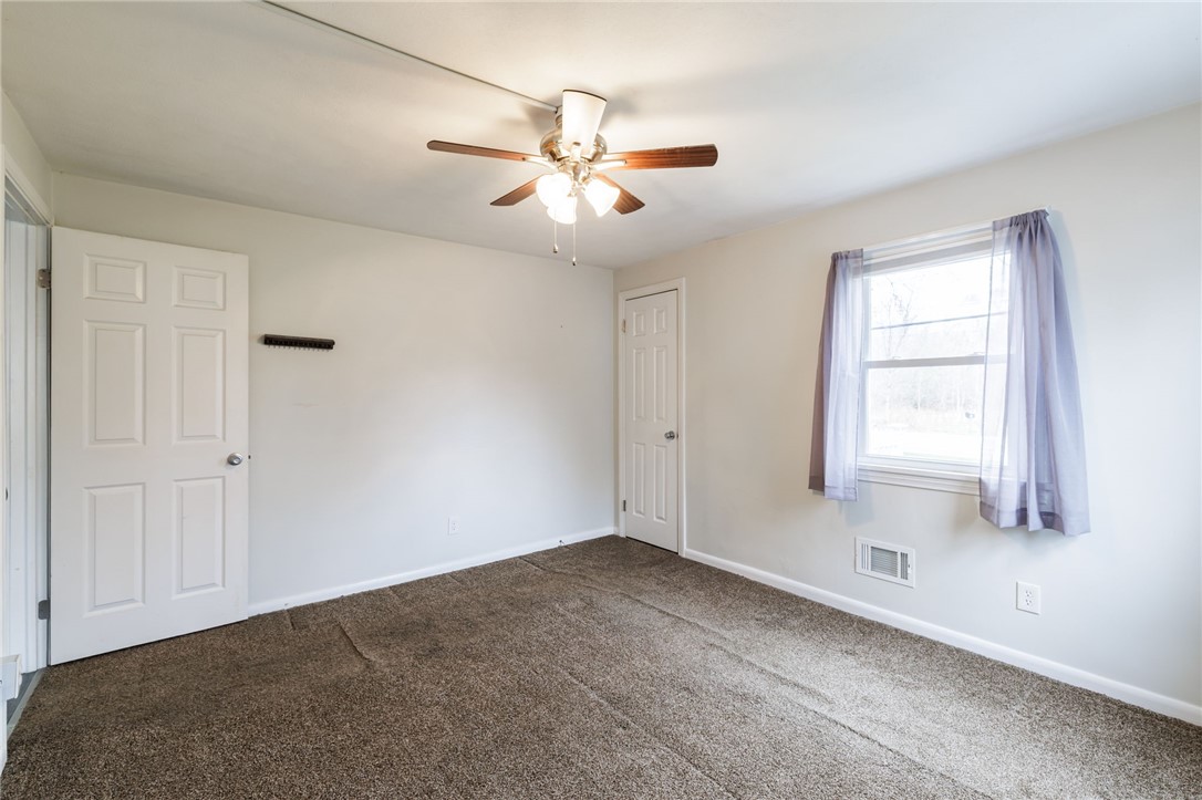 986 Gravel Road Webster, NY 14580 - Photo 19 of 36 Downstairs Bedroom