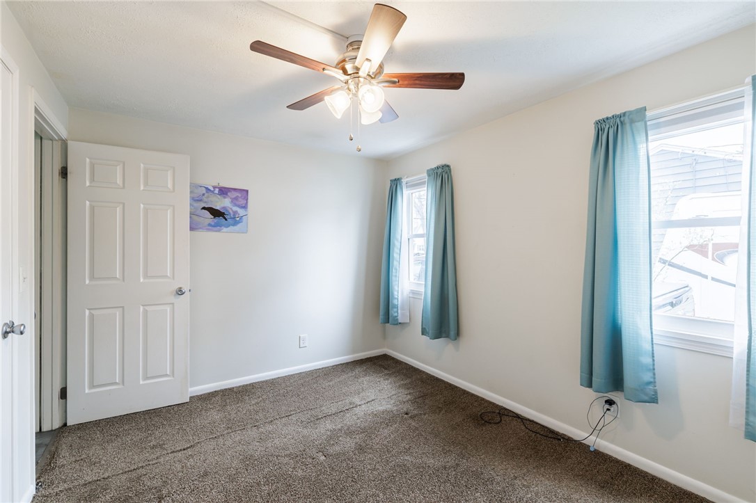 986 Gravel Road Webster, NY 14580 - Photo 23 of 36 Downstairs Bedroom