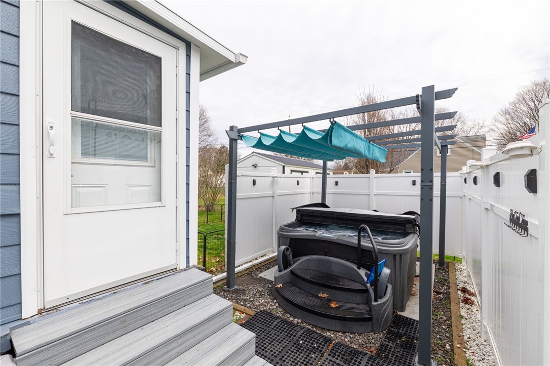 986 Gravel Road Webster, NY 14580 - Photo 34 of 36 Hot Tub w/ Privacy Fence