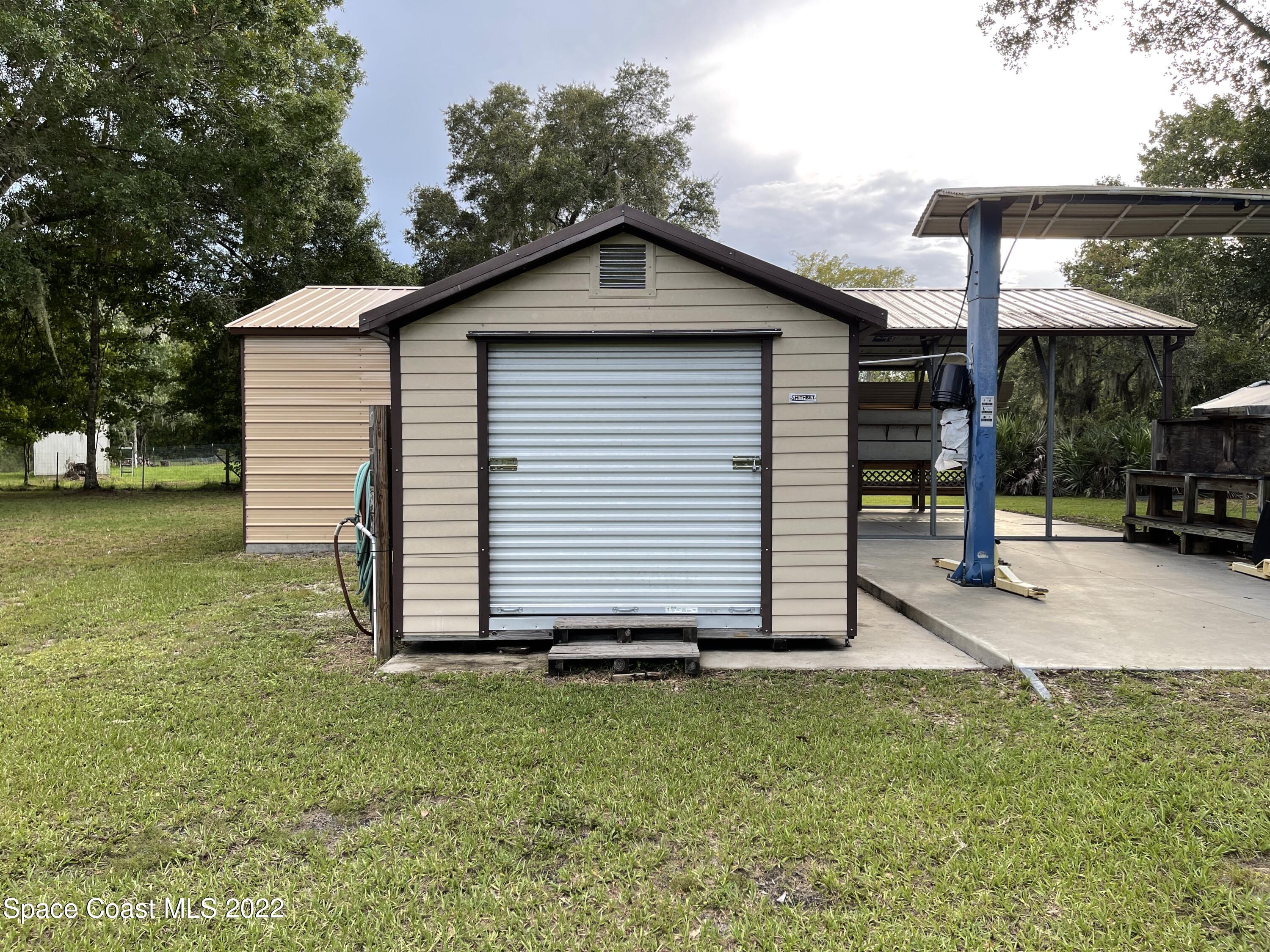 4680 Aurantia Road Mims, FL 32754 - Photo 36 of 56 Shed 1