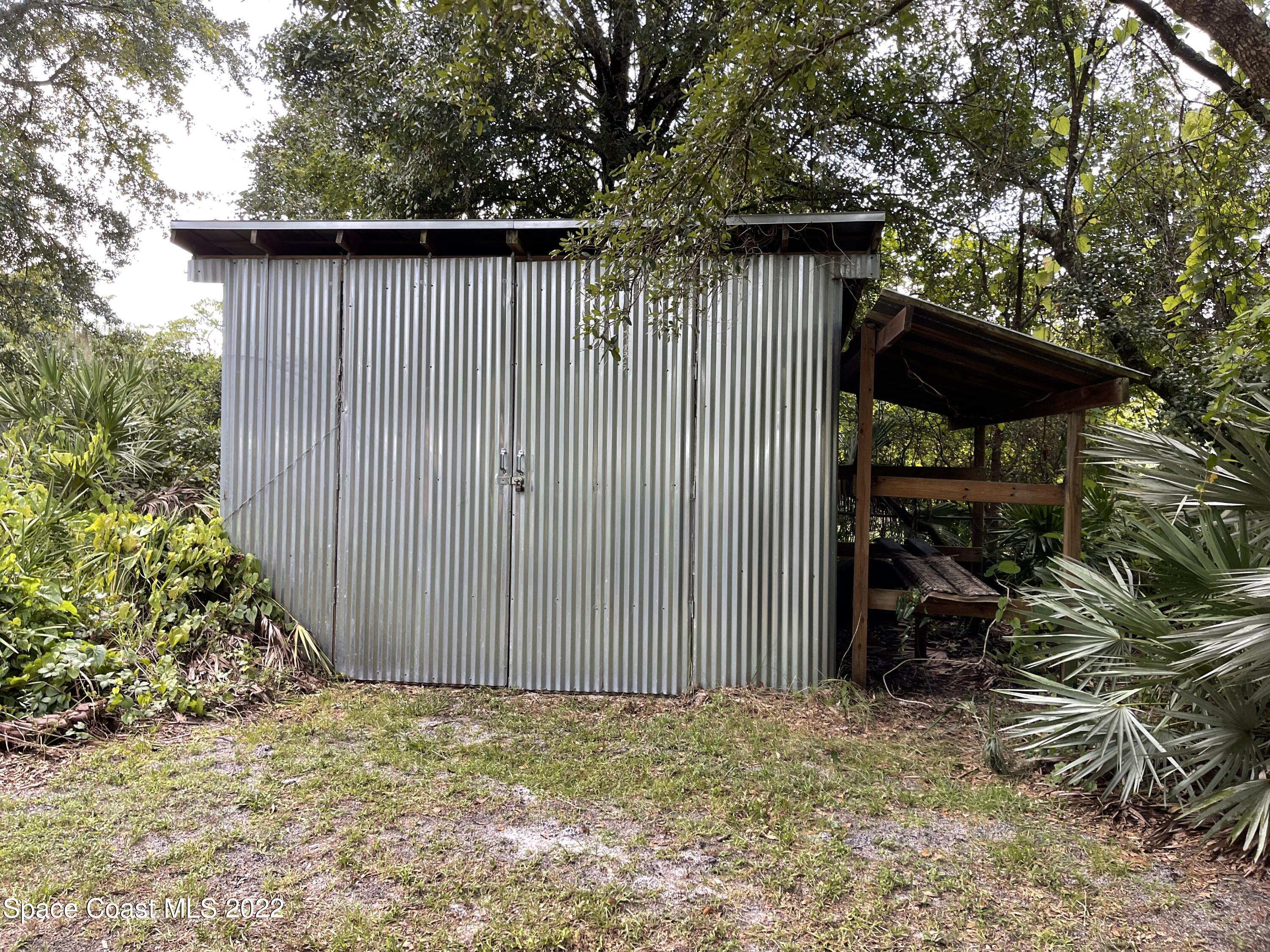4680 Aurantia Road Mims, FL 32754 - Photo 41 of 56 Rear Storage Area