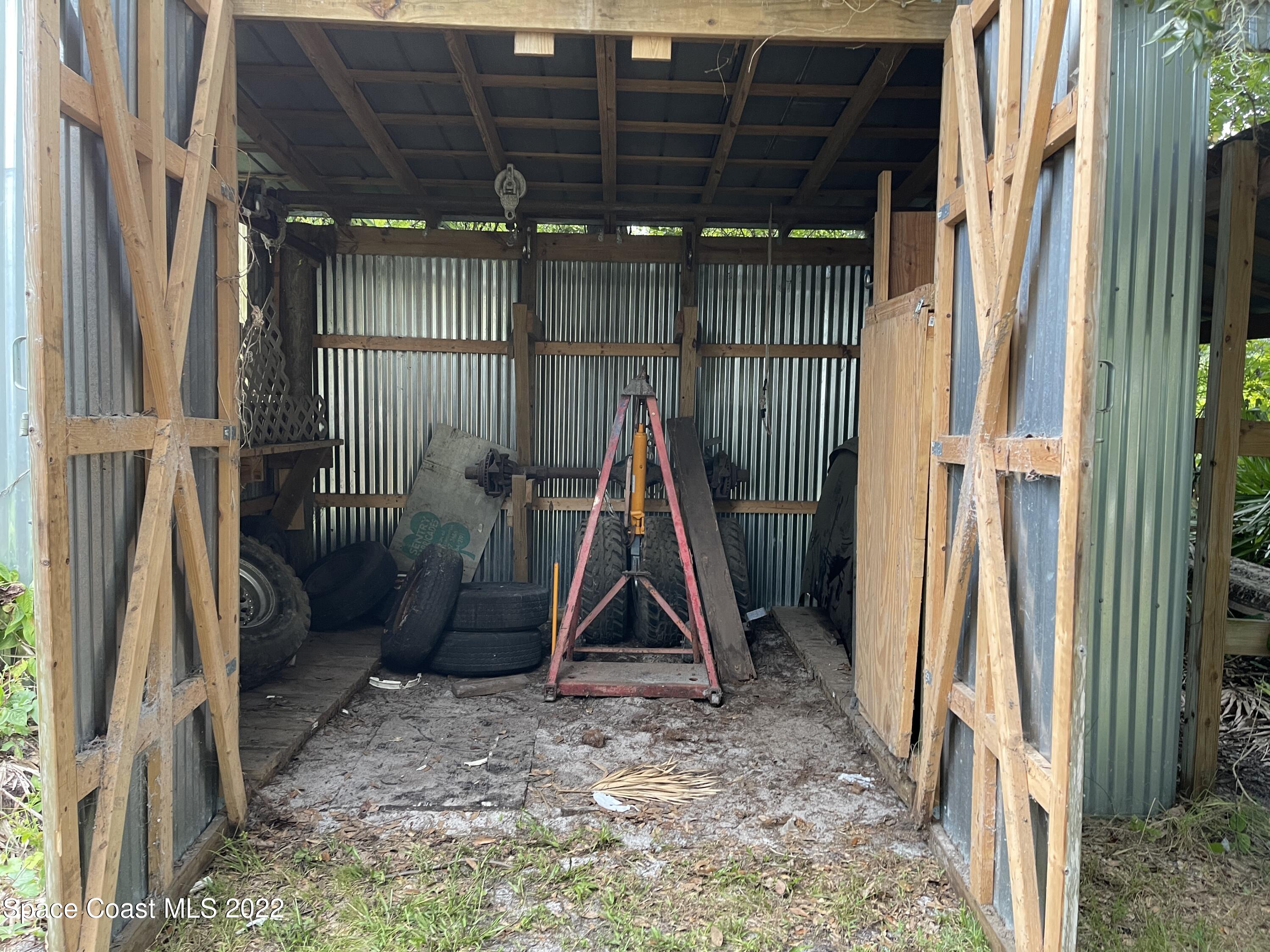 4680 Aurantia Road Mims, FL 32754 - Photo 42 of 56 Interior Rear Storage Area