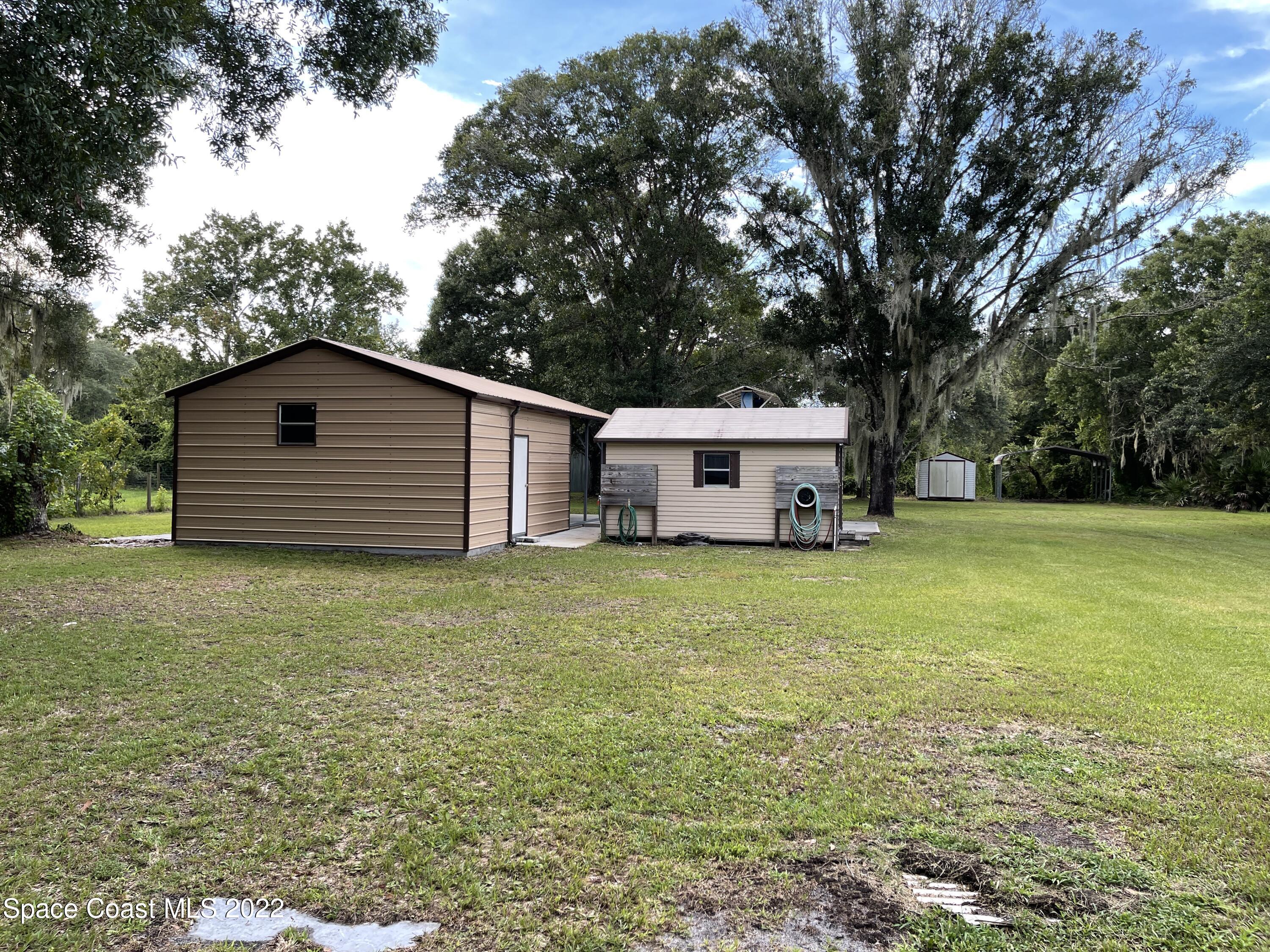 4680 Aurantia Road Mims, FL 32754 - Photo 46 of 56 Back of Property