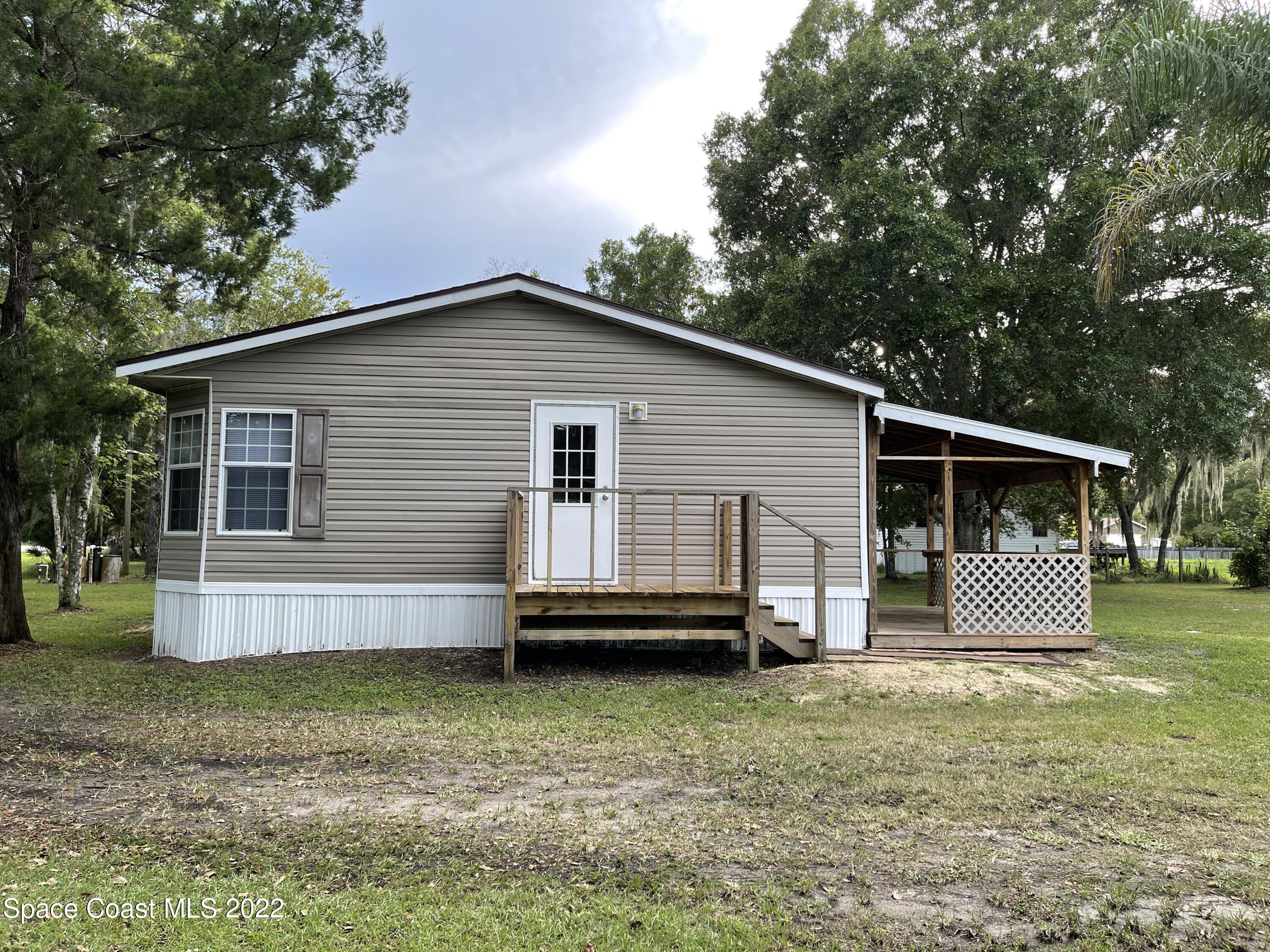 4680 Aurantia Road Mims, FL 32754 - Photo 49 of 56 Side View