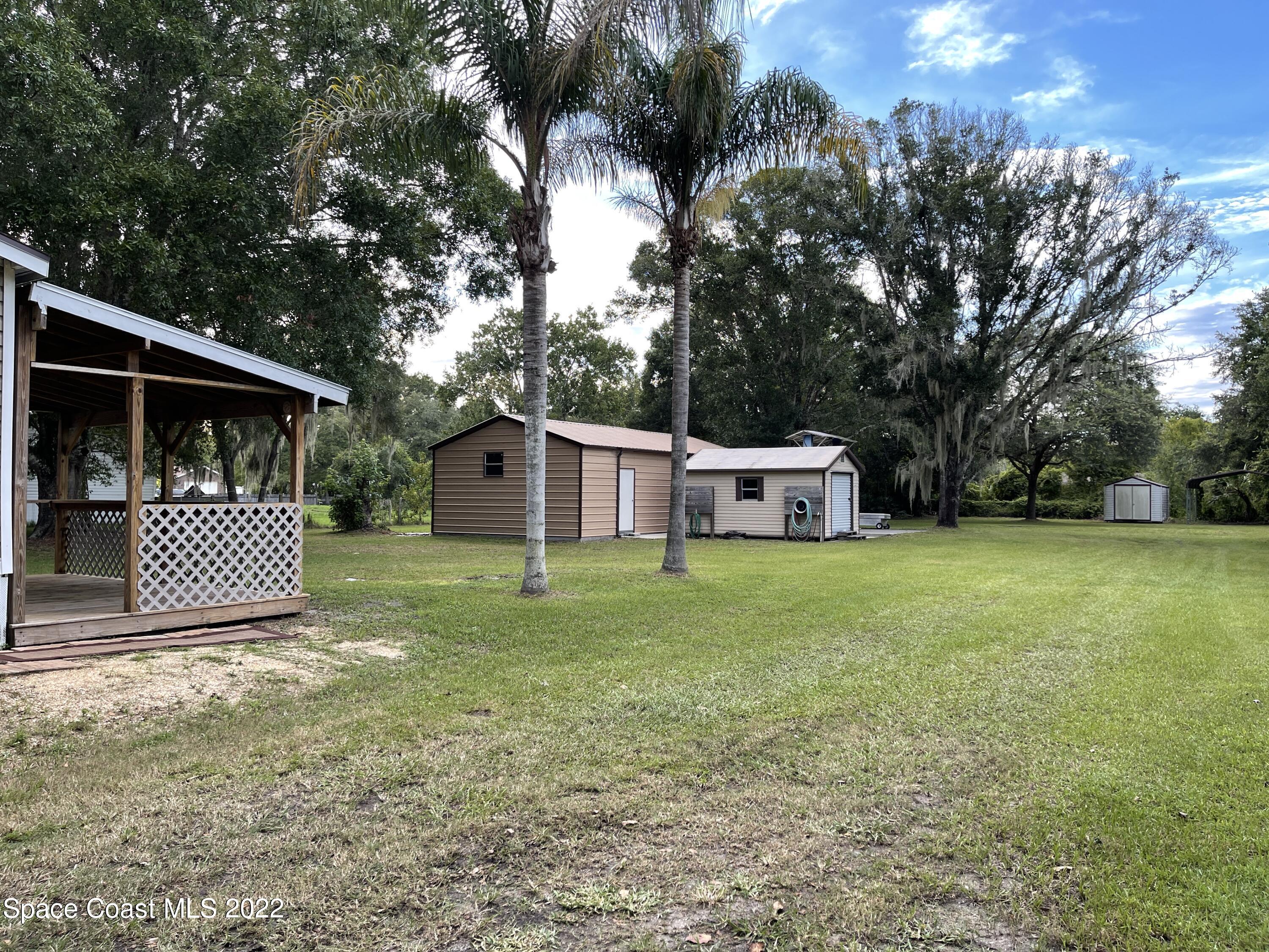4680 Aurantia Road Mims, FL 32754 - Photo 50 of 56 Side View