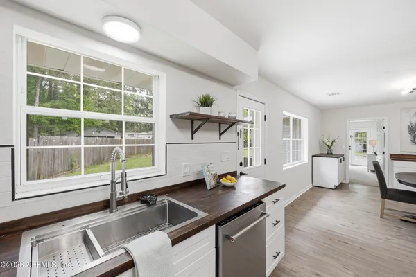 a bedroom with a bed and a desk