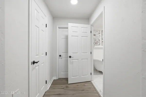 a room with furniture and air hockey table