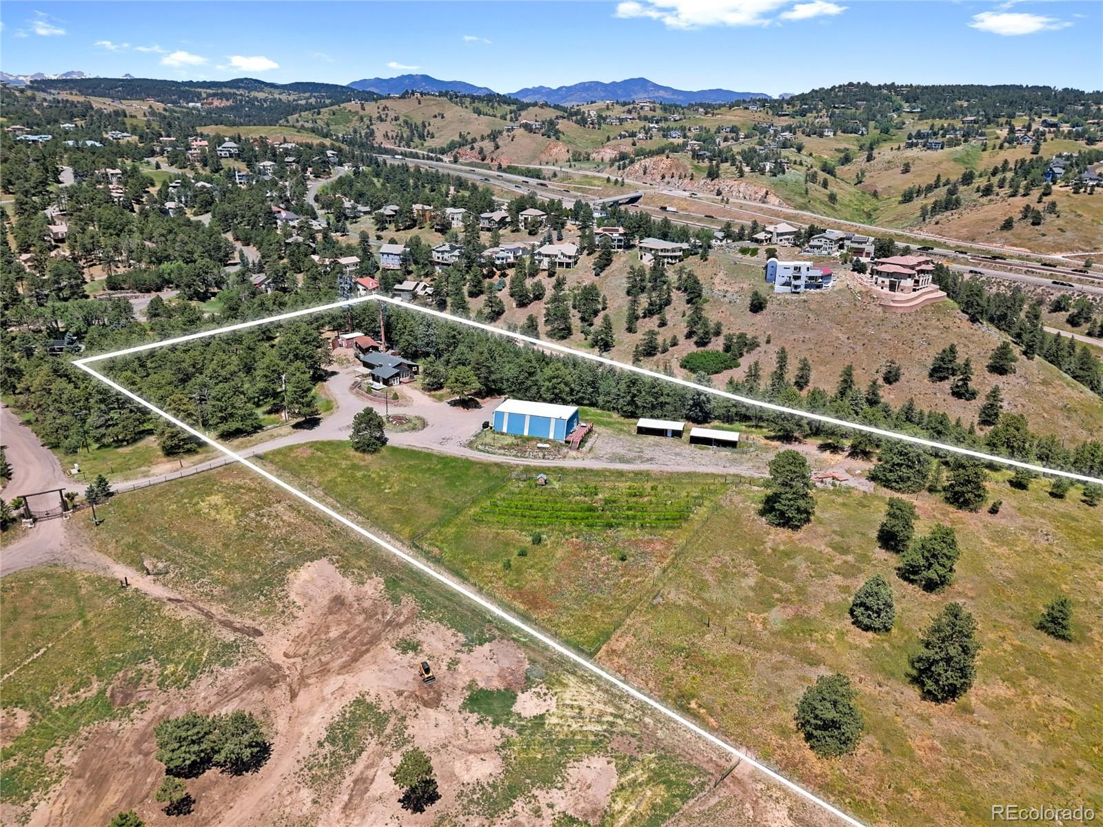 1044 South Grapevine Road Golden, CO 80401 - Photo 44 of 46 a view of a city with a mountain