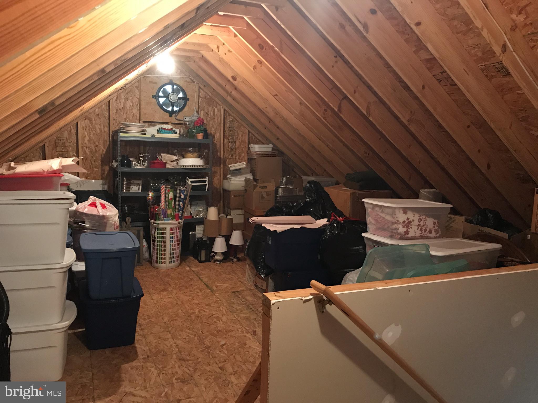 80 Elnor Road Bumpass, VA 23024 - Photo 19 of 25 Fixed stairs walk up to lots of attic storage