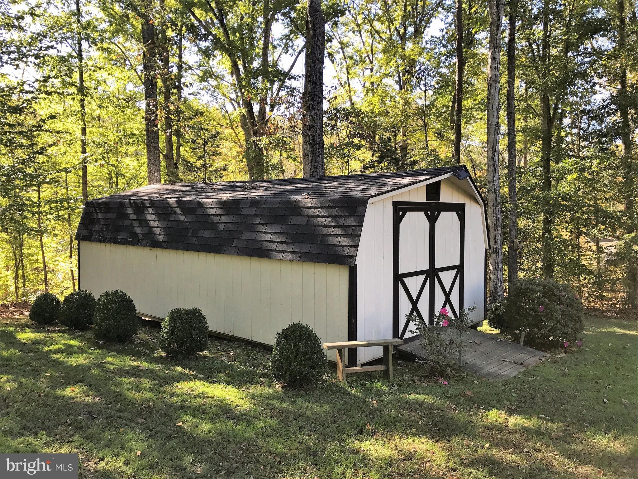 80 Elnor Road Bumpass, VA 23024 - Photo 23 of 25 12x24 shed towards rear of yard.