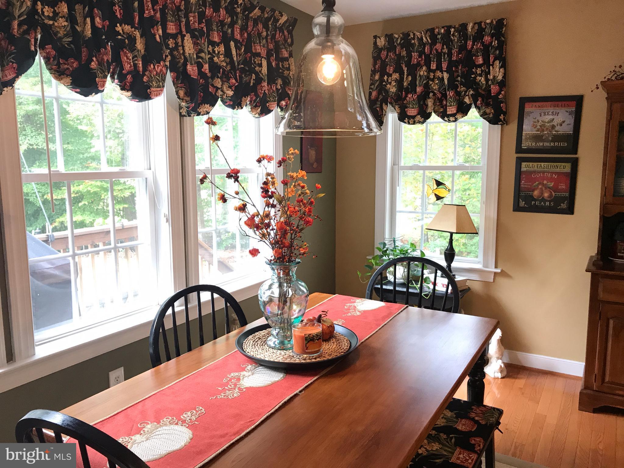 80 Elnor Road Bumpass, VA 23024 - Photo 9 of 25 Family time around the kitchen table
