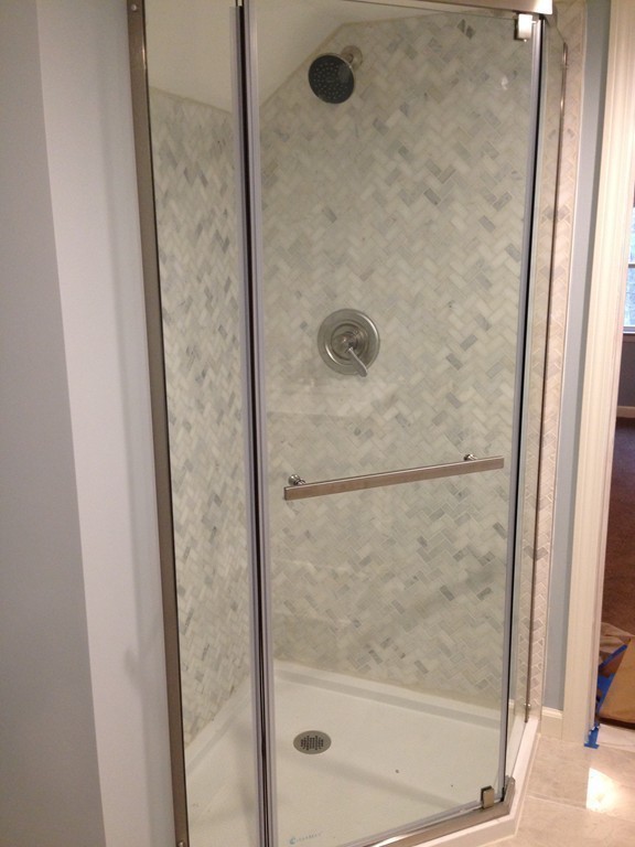 137 Maxwell Road Monson, MA 01057 - Photo 11 of 21 a bathroom with a glass shower door