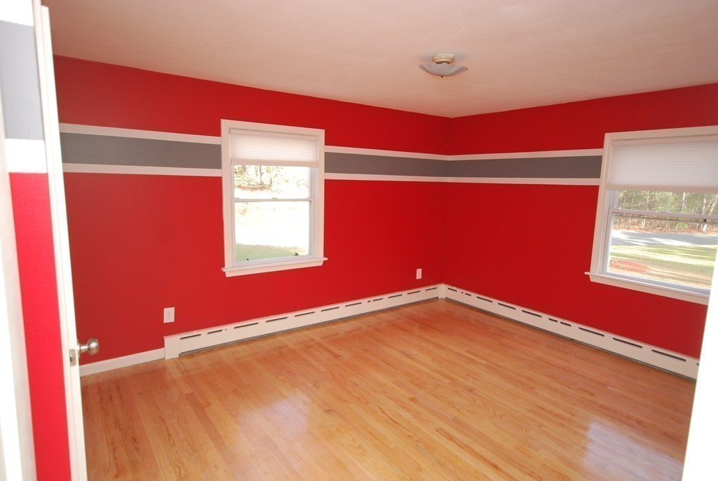 137 Maxwell Road Monson, MA 01057 - Photo 14 of 21 a view of a room with wooden floor and windows