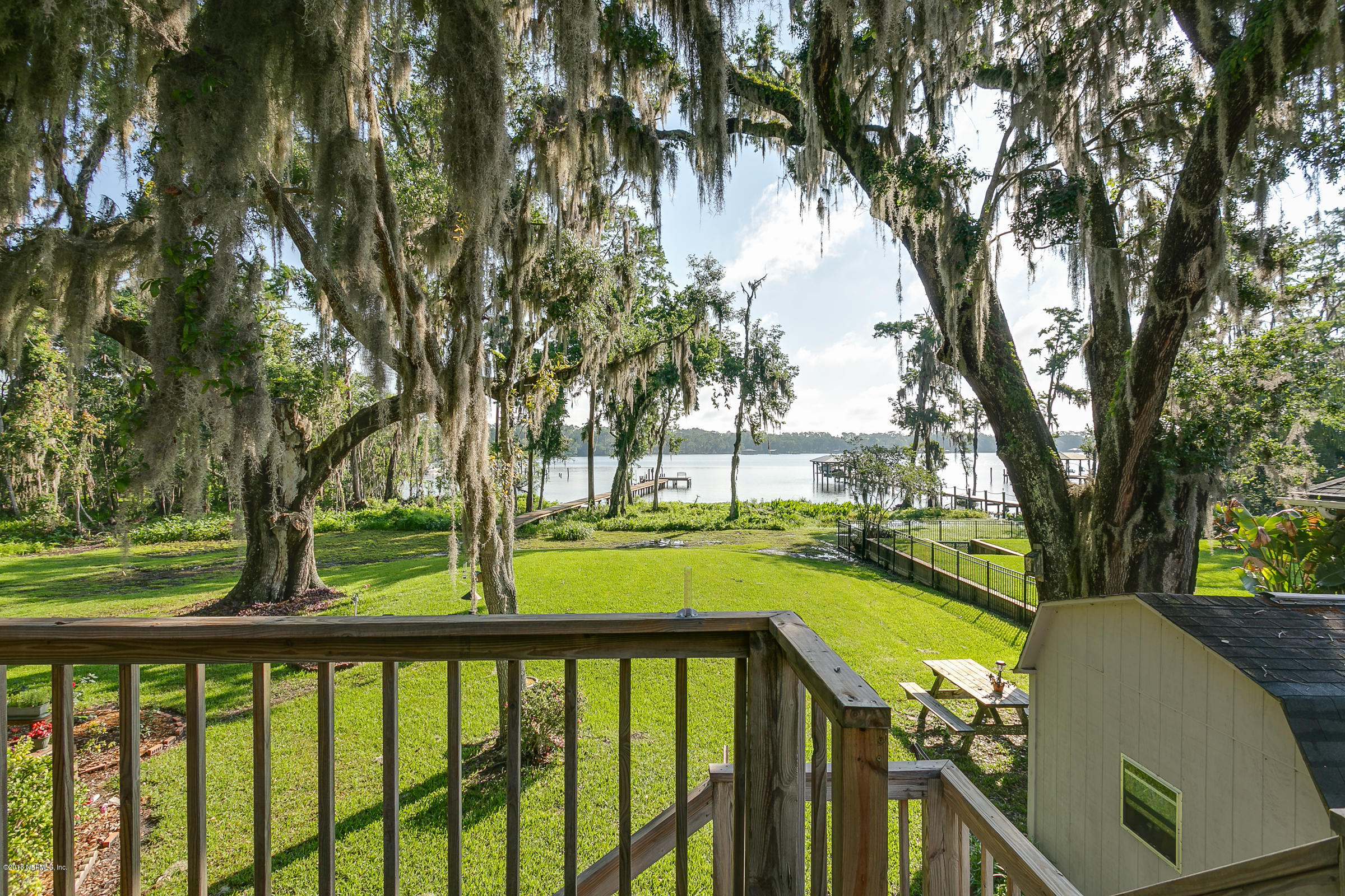 5562 Steamboat Road St. Augustine, FL 32092 - Photo 20 of 49 a view of swimming pool with garden and deck