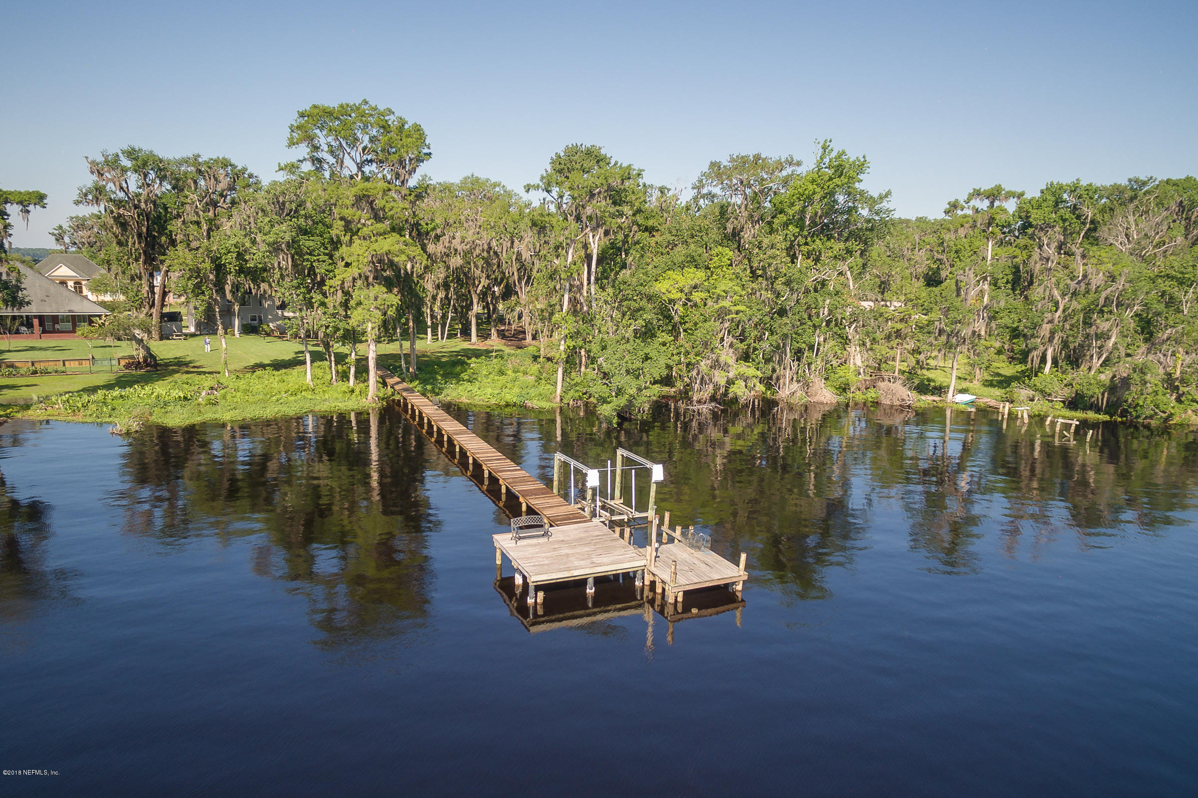 5562 Steamboat Road St. Augustine, FL 32092 - Photo 2 of 49 a lake view with a mountain view