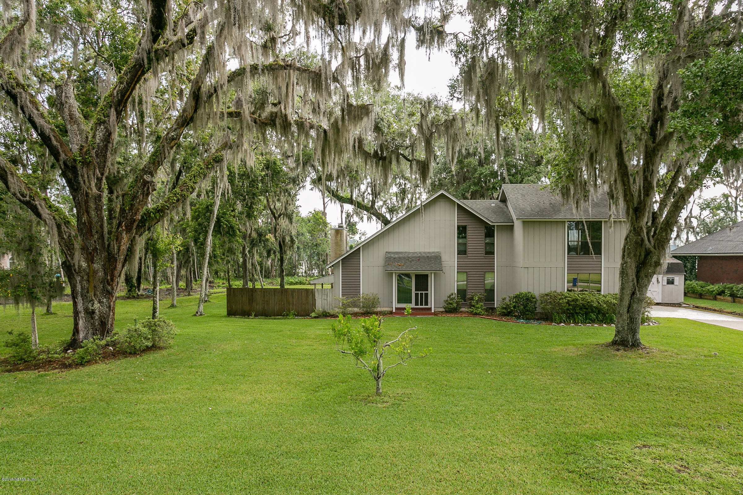 5562 Steamboat Road St. Augustine, FL 32092 - Photo 34 of 49 a view of a house with a yard