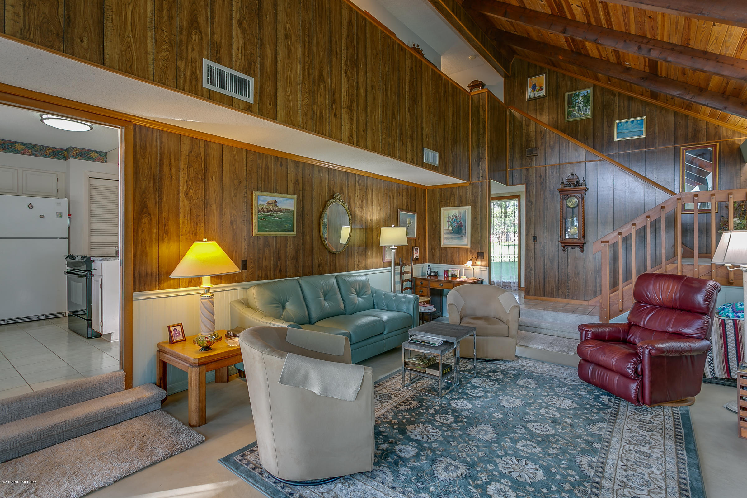 5562 Steamboat Road St. Augustine, FL 32092 - Photo 5 of 49 a living room filled with furniture