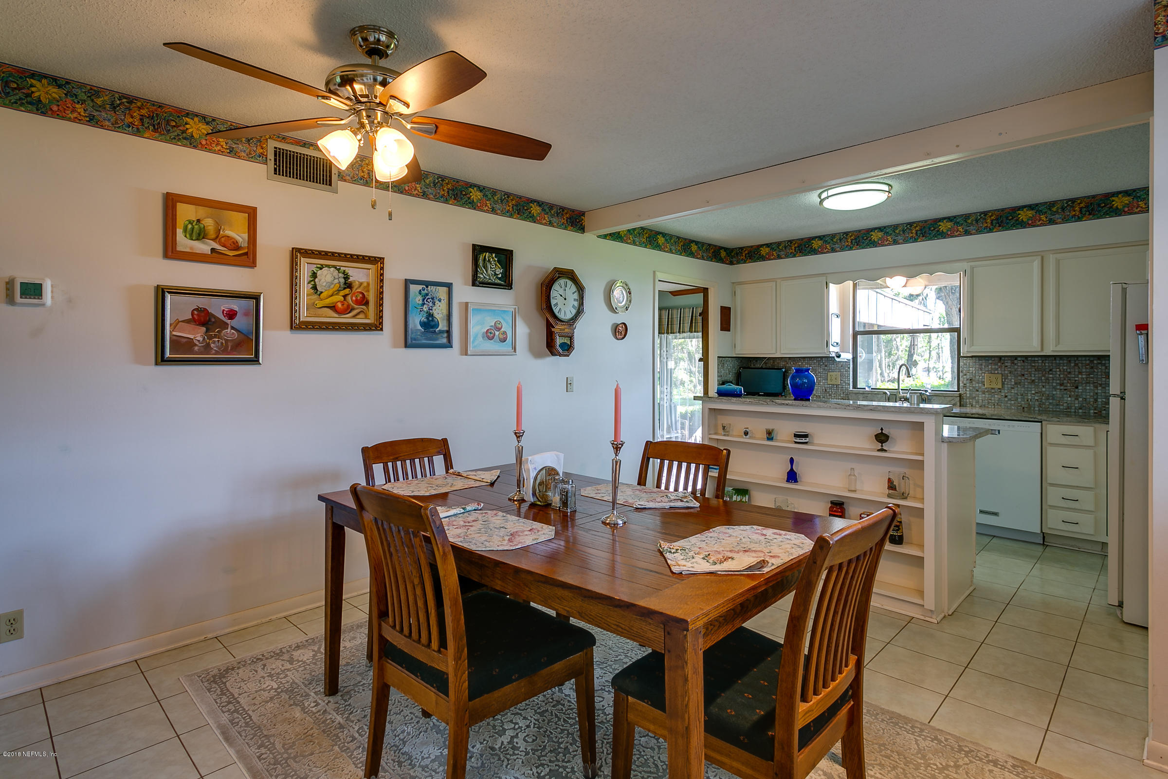 5562 Steamboat Road St. Augustine, FL 32092 - Photo 10 of 49 a view of a dining room with furniture