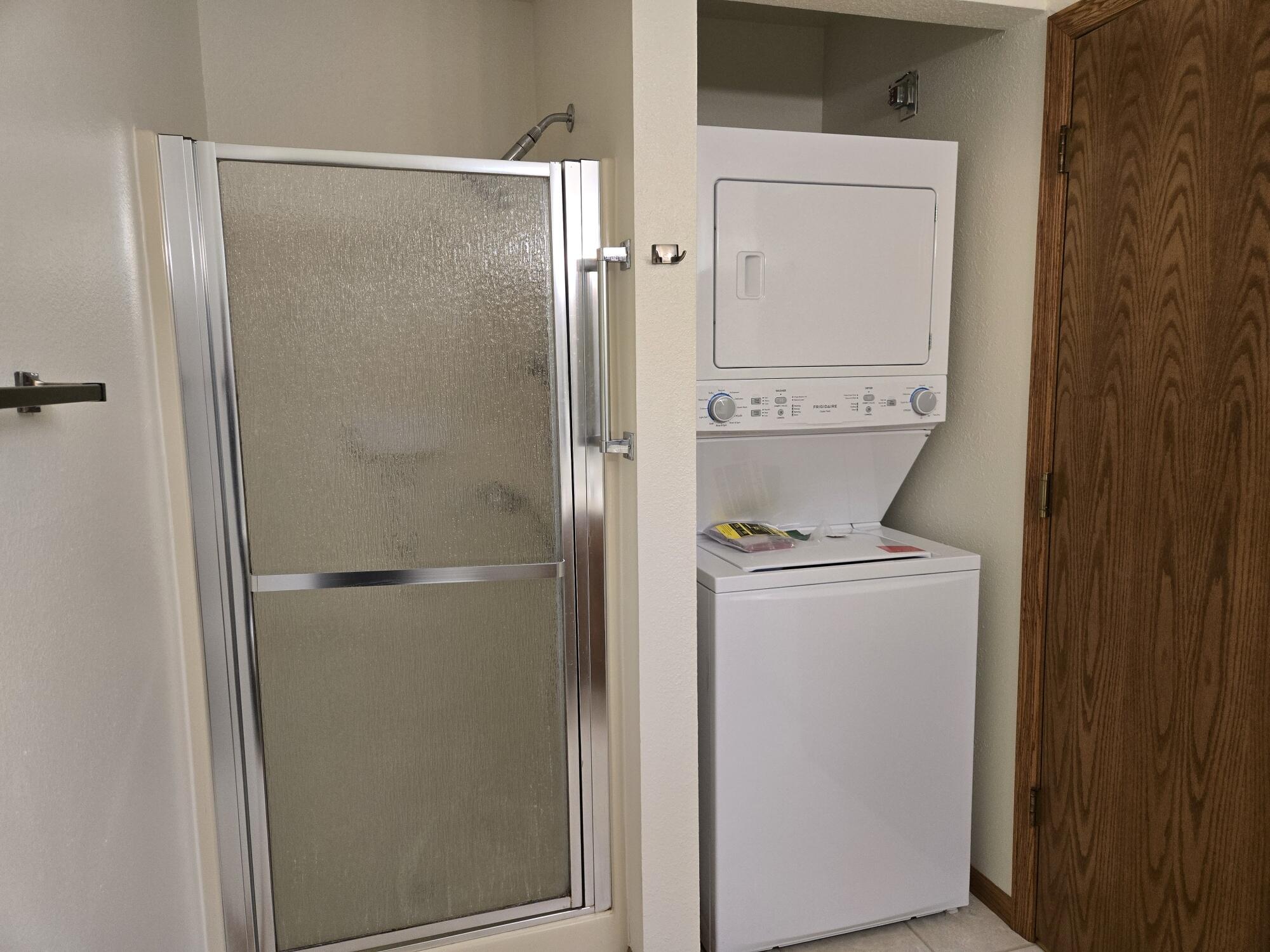 1661 Wisconsin Street, Unit 6 Sturtevant, WI 53177 - Photo 14 of 17 Bath #2 shower ^ stackable W/D