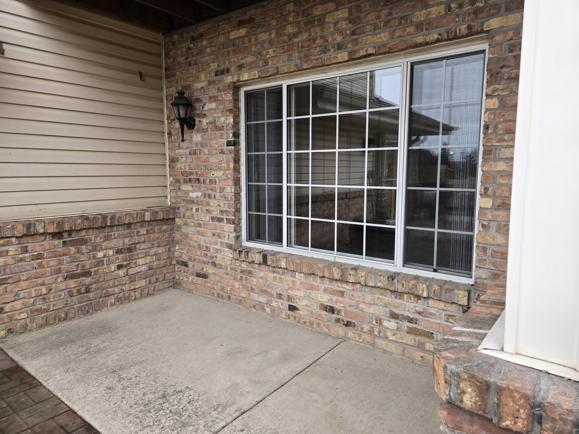 1661 Wisconsin Street, Unit 6 Sturtevant, WI 53177 - Photo 3 of 17 Great size patio