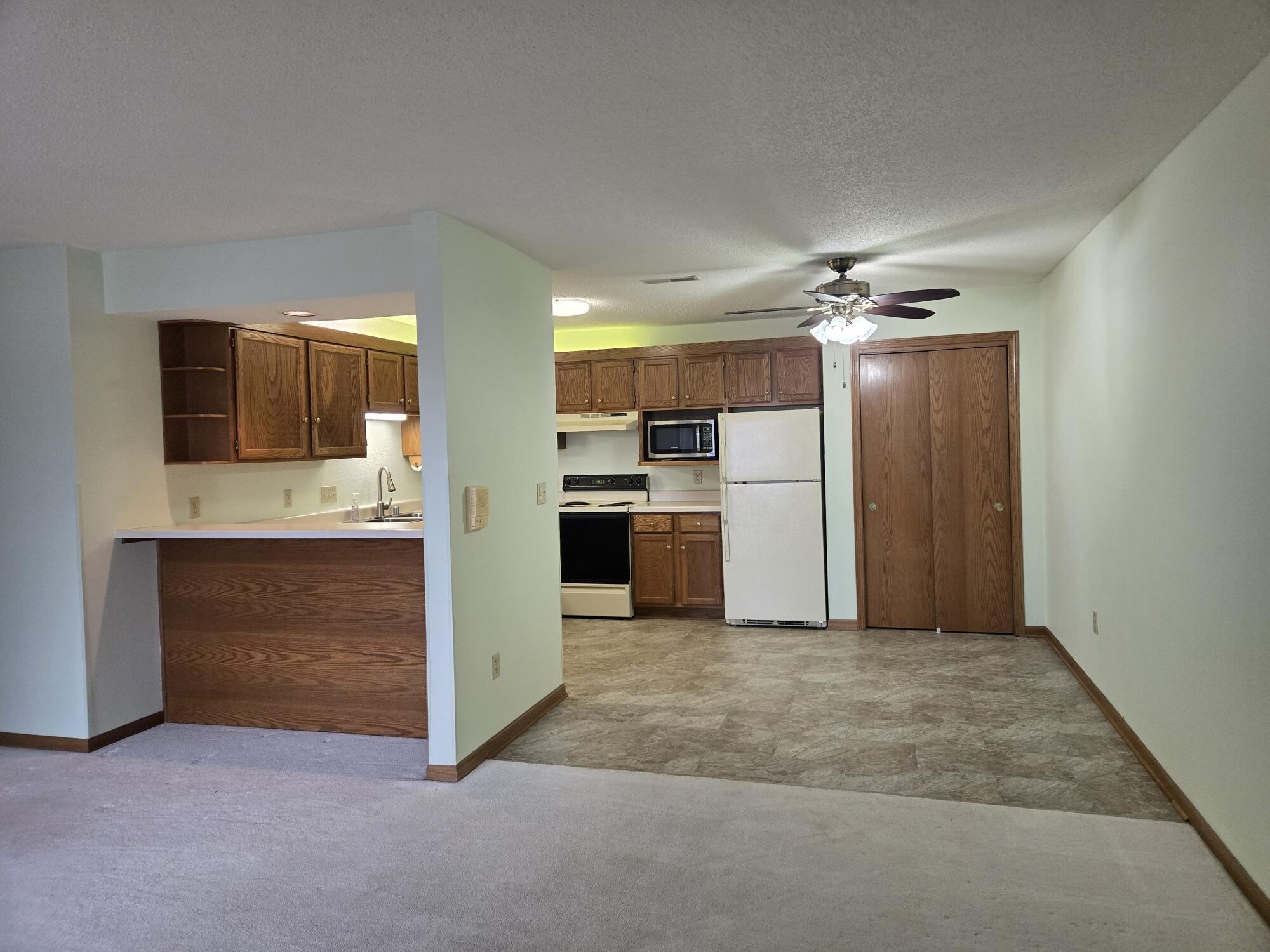 1661 Wisconsin Street, Unit 6 Sturtevant, WI 53177 - Photo 4 of 17 Kitchen/Dining & pantry