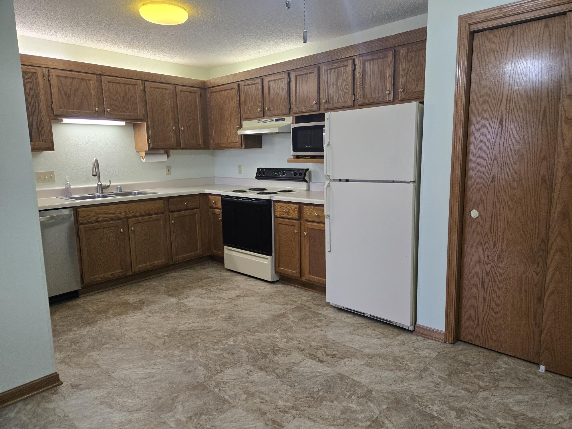 1661 Wisconsin Street, Unit 6 Sturtevant, WI 53177 - Photo 5 of 17 Loads of cabinets