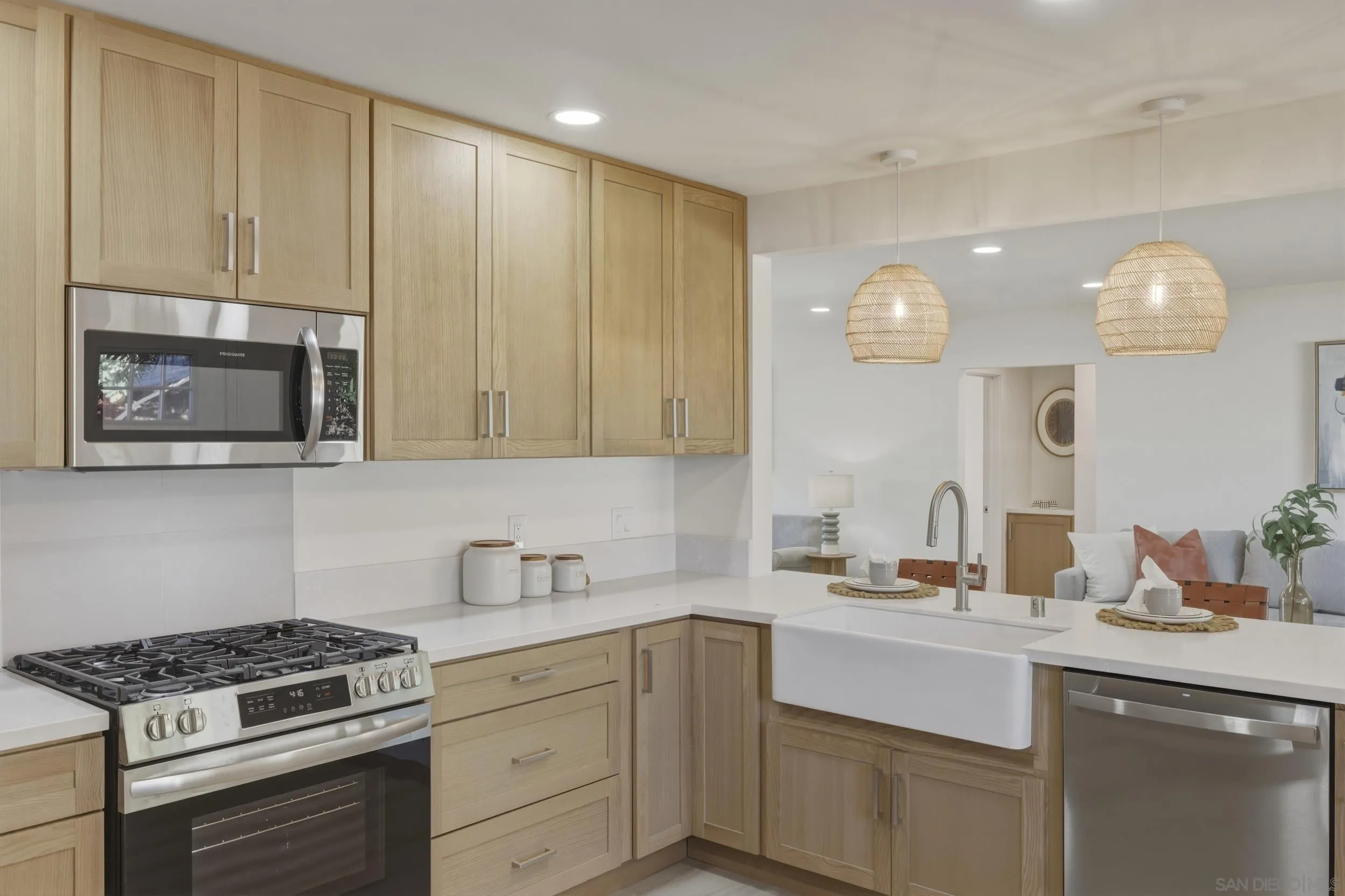 1862 Washington Street Lemon Grove, CA 91945 - Photo 11 of 32 a kitchen with cabinets and stainless steel appliances