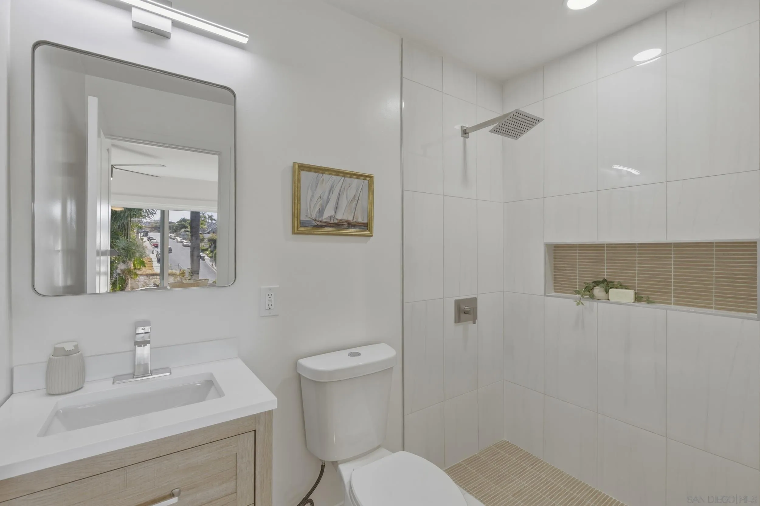 1862 Washington Street Lemon Grove, CA 91945 - Photo 14 of 32 a bathroom with a toilet sink vanity granite and shower