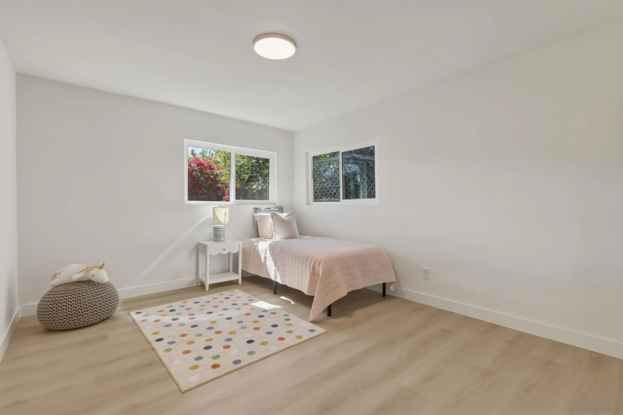 1862 Washington Street Lemon Grove, CA 91945 - Photo 15 of 32 a bedroom with a bed and a window