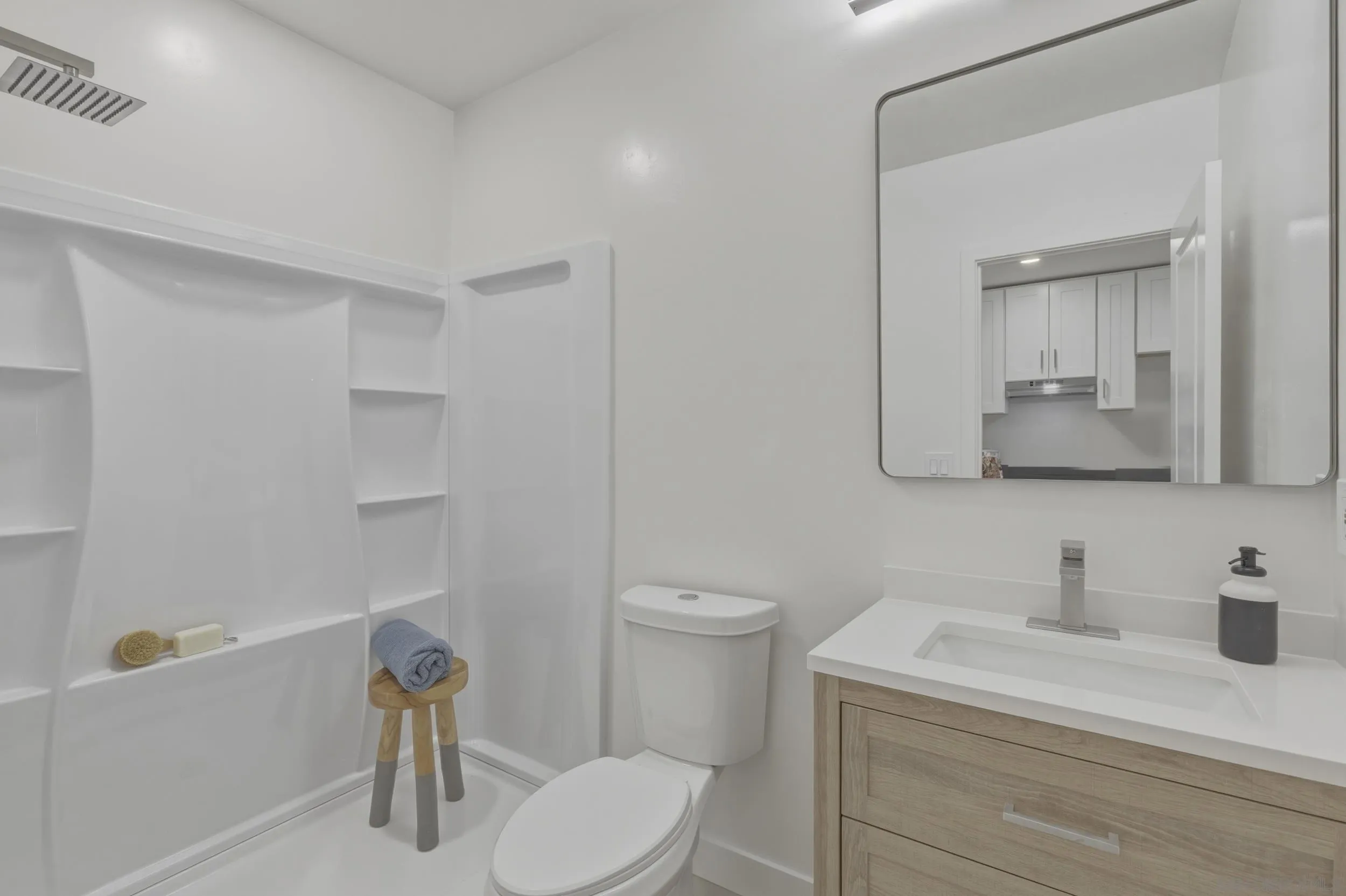 1862 Washington Street Lemon Grove, CA 91945 - Photo 22 of 32 a bathroom with a sink a toilet and mirror
