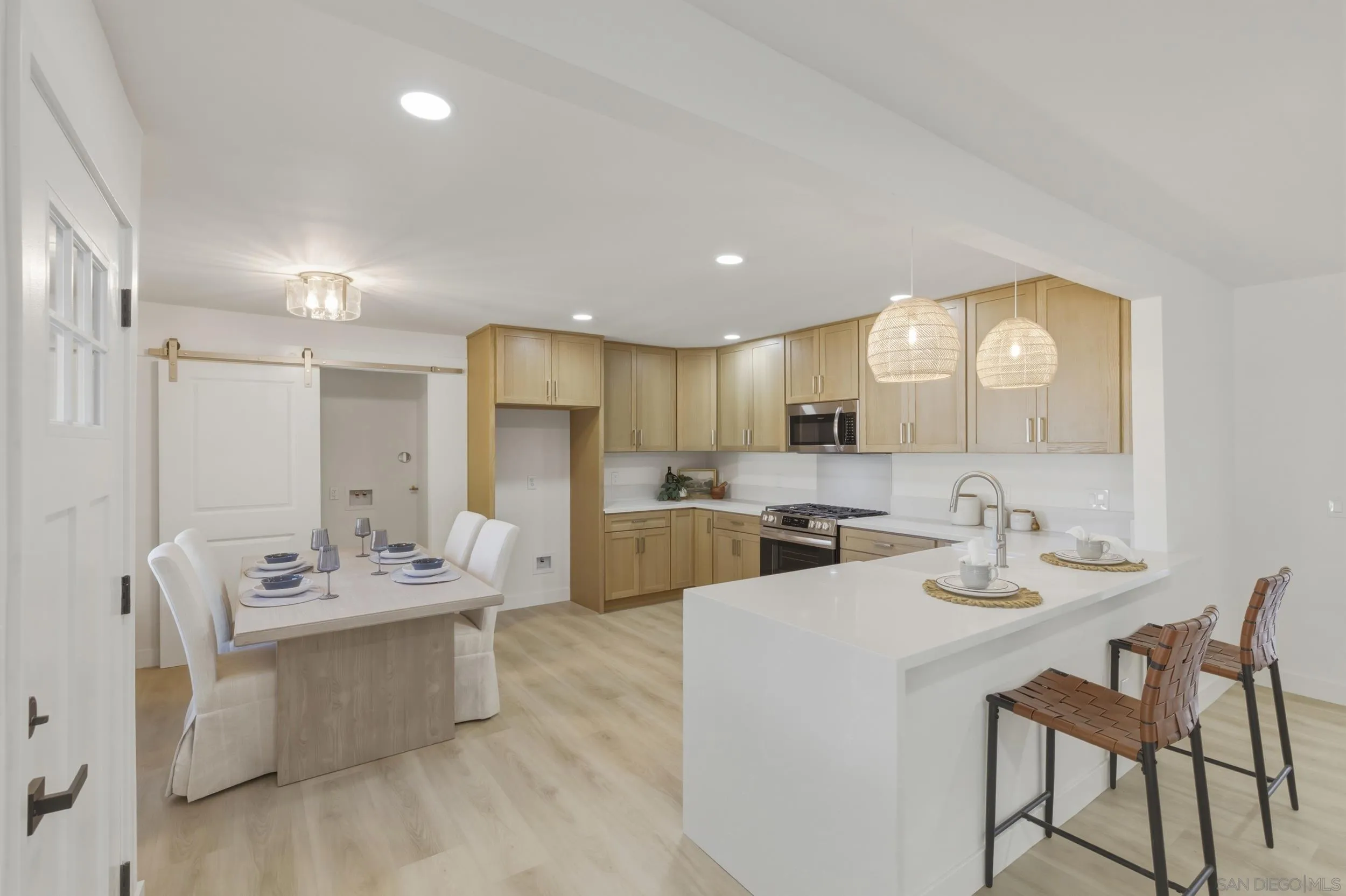 1862 Washington Street Lemon Grove, CA 91945 - Photo 10 of 32 a kitchen with a sink cabinets and wooden floor