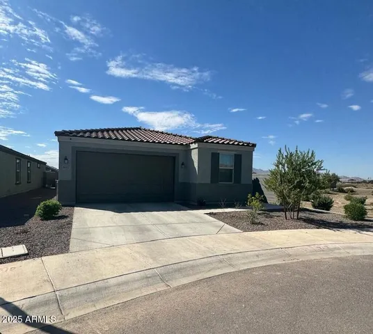 a car parked in front of a house