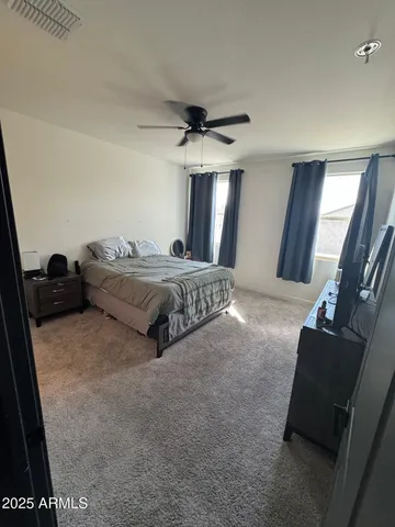 a bathroom with a double vanity sink a and mirror