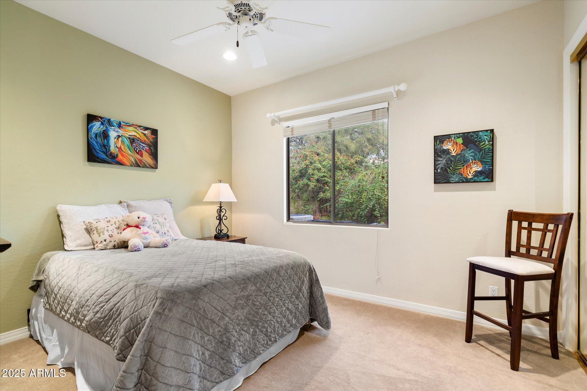 6867 East Crimson Sky Trail Scottsdale, AZ 85266 - Photo 33 of 97 a bedroom with a bed and a painting on the wall