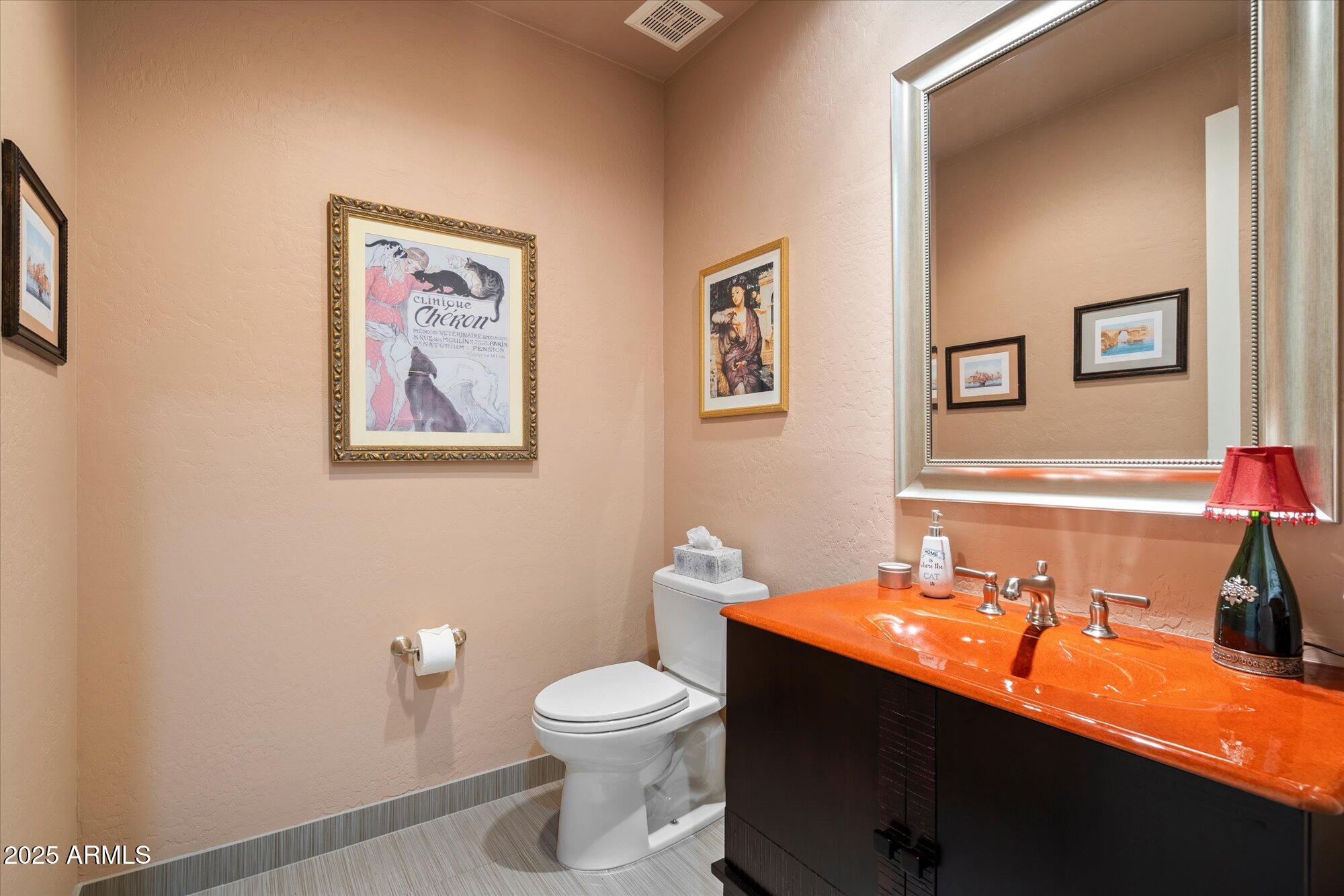 6867 East Crimson Sky Trail Scottsdale, AZ 85266 - Photo 36 of 97 a bathroom with a sink and a toilet