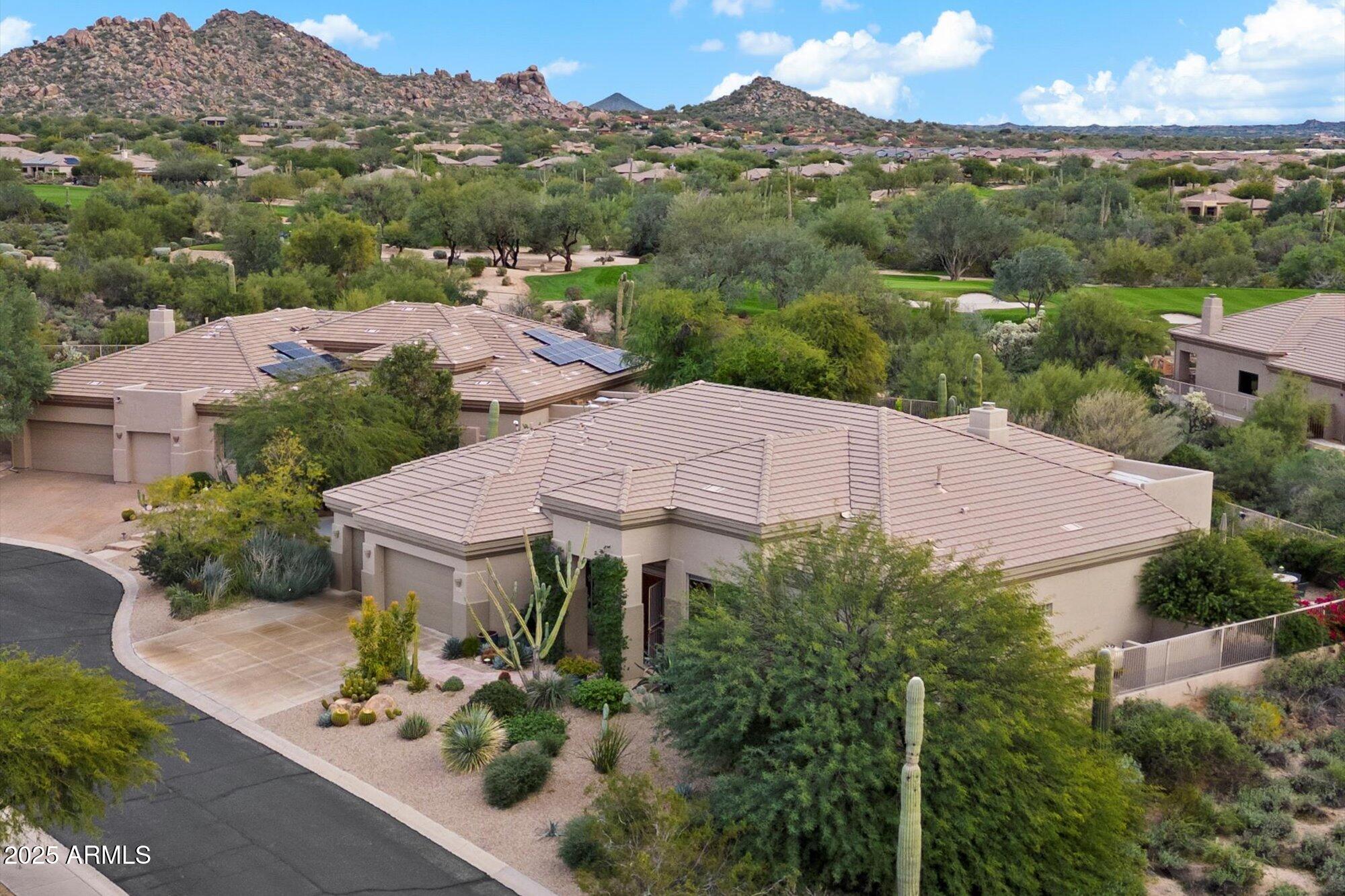 6867 East Crimson Sky Trail Scottsdale, AZ 85266 - Photo 4 of 97 an aerial view of a house with a garden