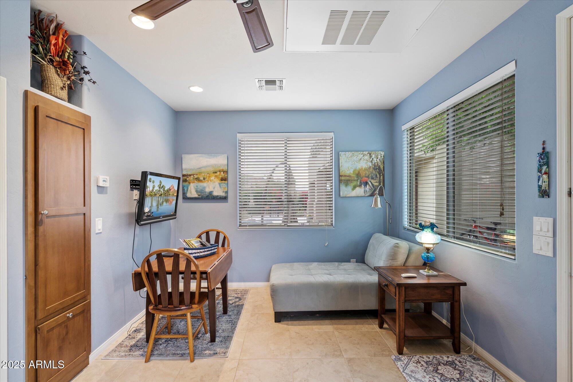 6867 East Crimson Sky Trail Scottsdale, AZ 85266 - Photo 49 of 97 a living room with furniture and a window