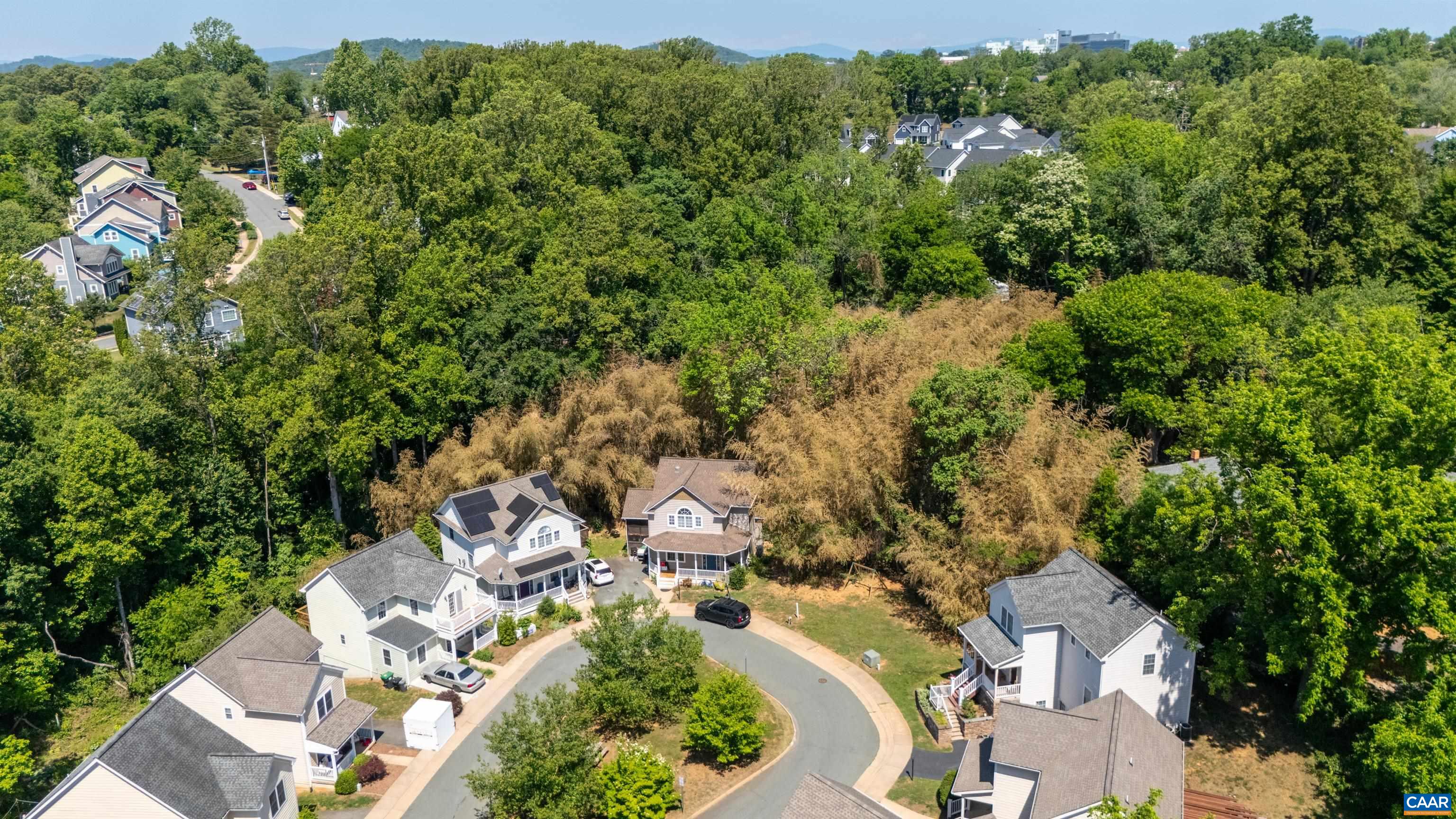125 Roy's Place Charlottesville, VA 22902 - Photo 16 of 19 an aerial view of residential house with outdoor space and trees all around
