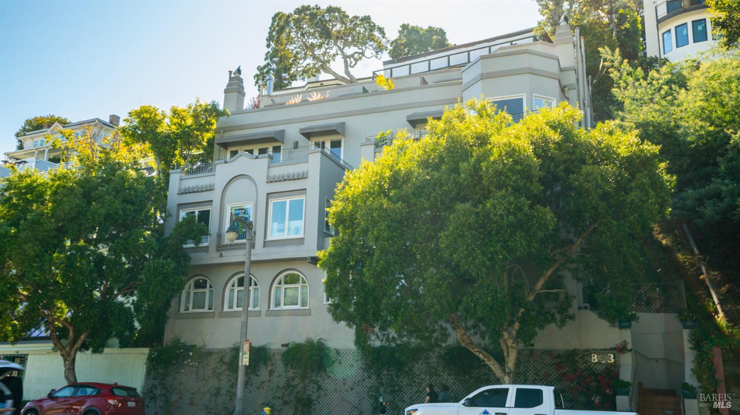 833 Bridgeway, Unit 5 Sausalito, CA 94965 - Photo 1 of 26 a front view of a house with a garden
