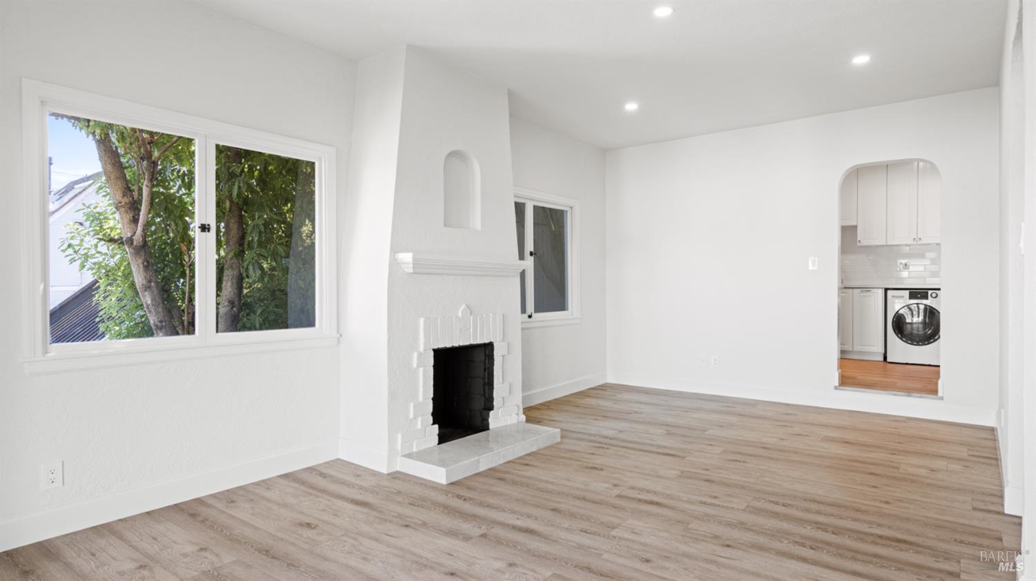 833 Bridgeway, Unit 5 Sausalito, CA 94965 - Photo 14 of 26 a view of empty room with wooden floor and fan