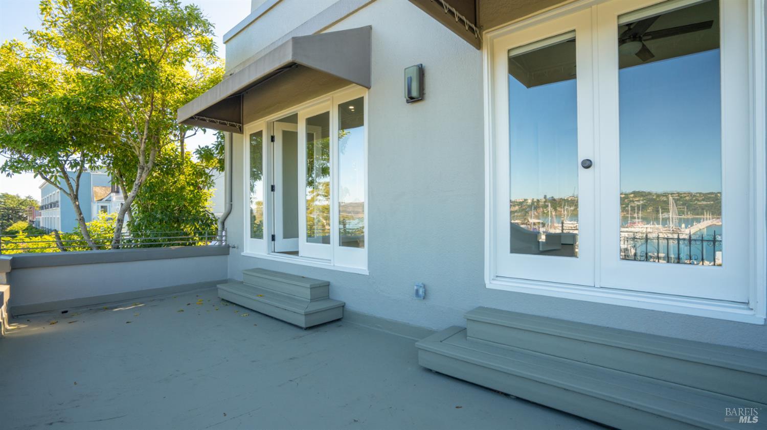 833 Bridgeway, Unit 5 Sausalito, CA 94965 - Photo 24 of 26 a view of house with backyard and outdoor seating
